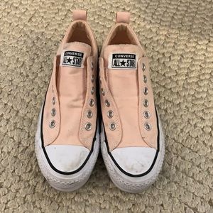 Pink slip on converse